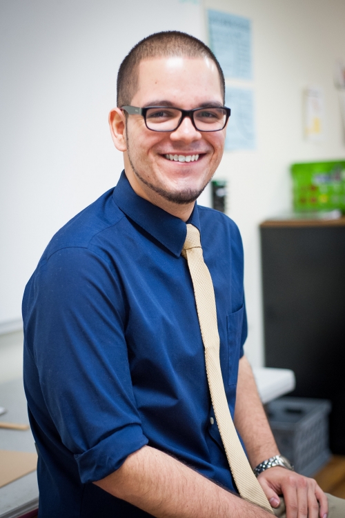 photo of Julio Alicea ’13 in his classroom